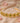 OMID, Gold-Plated Designer Floral Headband for Women & Girls – Kundan Style Hair Accessory with Green Center Stones