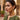 OMID Women Gold-Toned Green Stone Tassel Drop Earrings