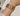 OMID Golden Tone Waves Shaped Brass Bracelet