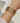 OMID Golden Tone Waves Shaped Brass Bracelet