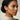 Model wearing OMID Orange Beaded Drop Earrings
