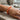  wearing OMID Purple & Orange Beaded Stretch Bracelet on hand
 
